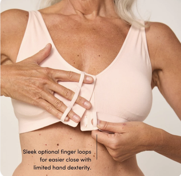 Beige bra with loop for fingers shown fastening at the front